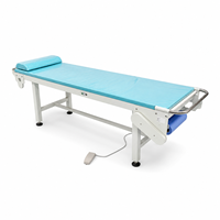 Table d'examen médical à hauteur fixe avec système de défilement électrique du papier et commande au pied pour cliniques et hôpitaux