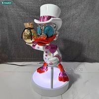 Sculpture de canard en résine de luxe avec sac d'argent, statue de canard de dessin animé, décoration moderne pour la maison, figurine d'art
