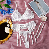 Ensemble de lingerie quatre pièces sexy avec porte-jarretelles brodé, effet push-up pour petite poitrine, pour femme