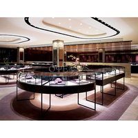 Comptoir de bijoux en bois de haute qualité vitrine murale moderne en métal vitrine de bijoux en verre personnalisé de luxe pour centre commercial