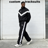 Ensemble de survêtement personnalisé pour homme en nylon, coupe oversize, avec broderie, veste coupe-vent résistante à l'eau à blocs de couleur et pantalon large à jambes larges