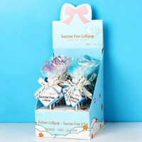 Sucettes dures fruitées sans sucre de 20g (motifs Dauphin, Licorne, Marguerite, Cerise, Queue de Sirène, Astronaute) en sachet pelliculé