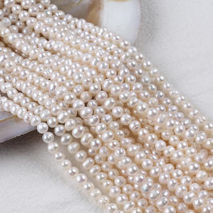 Collier et bracelet faits main avec des perles d'eau douce blanches naturelles de 5 à 6 mm, perles de forme irrégulière, style Zhuji - Product Image 1