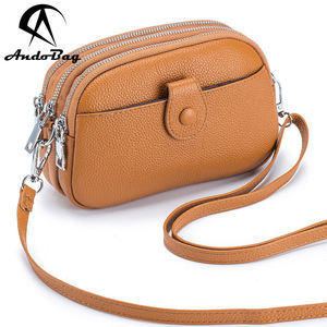 กระเป๋าหนังวัวแท้ AndoBag รุ่นใหม่ แฟชั่นกระเป๋าสะพายข้างสำหรับผู้หญิง สาวๆ ความจุเยอะ กระเป๋าสะพายไหล่ทรงสี่เหลี่ยมเล็กใส่โทรศัพท์ รุ่น 9995 - Product Image 1