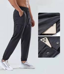 Pantalones de chándal impermeables ligeros para gimnasio Fitness originales de talla grande con logotipo personalizado gratis para hombre con bolsillos Joggers para hombre - Product Image 2
