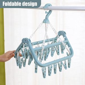 Organizador de Ropa de un Solo Nivel, Plegable, de Plástico, con 32 Pinzas y Colgador de Secado - Product Image 3