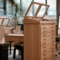Vitrine à lunettes vintage en bois massif avec plusieurs tiroirs, éclairage LED, design écologique |   Vitrine équipée d'un miroir rabattable