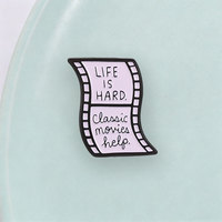 Badge en émail à citation de film, style bande de film, pour vêtements, sacs à dos et décoration