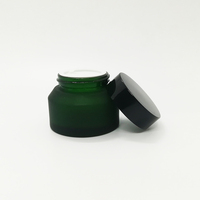 ODM 15ml 30ml 50ml 100ml Pot en verre vide de couleur verte Pot en verre de crème cosmétique Pot en verre d'épaule en pente Pot avec couvercle à vis Fabrication