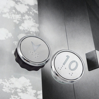 Bouton poussoir d'ascenseur rond chromé avec symbole personnalisé en braille, bouton d'appel d'ascenseur, pièces détachées d'ascenseur OEM ODM