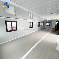 Conteneurs mobiles de luxe prêts à l'emploi, extensibles, au design moderne et respirant, avec des configurations polyvalentes, pour bâtiments de bureaux modulaires.