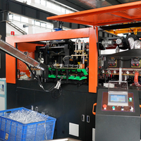 Machine de soufflage de bouteilles PET sur mesure 9000BPH à 6 cavités, OEM/ODM, adaptée aux spécifications de dimension des bouteilles