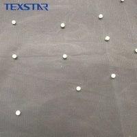 Tissu en tulle perlé tricoté 100 % polyester doux et antistatique, orné de perles, pour vêtements de luxe et voiles de mariée