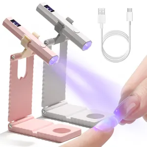 โคมไฟอบเล็บไร้สายพร้อมขาตั้ง ไฟยูวีแบบพกพาพร้อมจอ LCD สำหรับเล็บเจล เครื่องอบเล็บแบบชาร์จ USB สำหรับการอบแห้งอย่างรวดเร็ว - Product Image 1