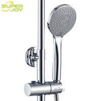Kit de douche apparent rond chromé Essentials, coloré or et noir, avec barre coulissante, système de colonne de douche moderne pour maison et hôtel, mitigeur