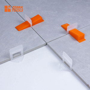 Chuyên nghiệp Mức độ tiêu chuẩn gạch đặt phụ kiện hiện đại gạch san lấp mặt bằng hệ thống sàn Clip OEM chấp nhận xây dựng san lấp mặt bằng - Product Image 1