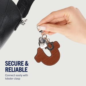 Breloque de sac en forme de fer à cheval gaufré avec pendentif cœur et détail logo, finition dorée, couleur cognac - Product Image 4