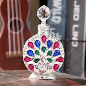 Botella de <span class=keywords><strong>Perfume</strong></span> de Metal con piedras de pavo real, joyería patentada de 12ml, botella de cristal esencial de 0il, rellenable, n. ° 898 - Product Image 4