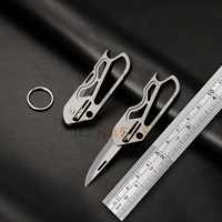 Porte-clés portable couteau pliant multifonctionnel Mini alliage de titane et acier inoxydable avec matériau métallique tranchant