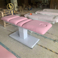 Table de massage et de beauté professionnelle pliable et réglable en similicuir blanc thermique, portable et moderne pour salon