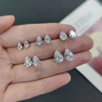 Boucles d'oreilles clous unisexes en moissanite de style Hepburn, taille poire, sertissage griffe d'aigle, disponibles en 0,5/1,5/2 carats, en argent sterling S925