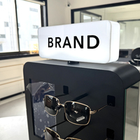 Présentoir pour lunettes et lunettes de soleil en bois, métal et verre pour magasin d'optique, avec support réglable en hauteur et personnalisable