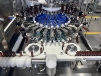 Machine de lavage de bouteilles rotative automatique industrielle à 32 buses pour ligne de production d'emballages de boissons