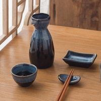 Mini tasse à saké en céramique émaillée de couleur bleue à changement de four de style rétro japonais pour la maison et le restaurant