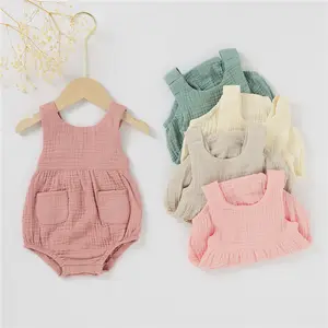 Verano algodón orgánico muselina ropa de bebé infantil sin mangas bolsillo mameluco bebé sólido mono