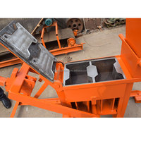 Machine de fabrication de briques à emboîtement en argile pressée à la main 2-40 blocs de terre en argile