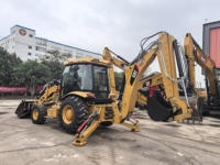 Chargeuse-pelleteuse CAT 420F d'occasion économique avec godet 4-en-1 et bras télescopique, en bon état pour travaux en espace restreint
