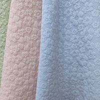 Nouveau tissu jacquard à motifs floraux en relief pour les vêtements féminins et enfantins printemps-été, robes, jupes et textiles de maison en stock