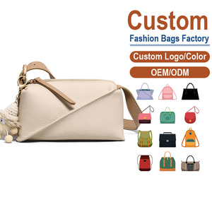 Sac bandoulière en cuir PU personnalisé, texture litchi ivoire, avec adorable pompon en fausse fourrure, mode hiver/automne, directement de l'usine - Product Image 1