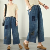 Nouveau Pantalon Large en Jean Bleu Brodé Floral Style Neo-Chinois Taille Haute Ample Coupe Courte pour Femme – Collection Printemps 2026 (Vente en Gros)