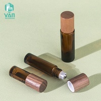 YAN kemasan Mini botol Roll kaca Amber 5ml 10ml 15ml mewah kosong dengan tutup kenari grosir untuk parfum & minyak esensial