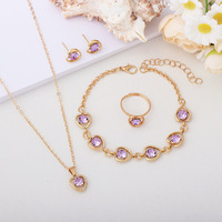 Ensemble de quatre pièces tendance transfrontalier européen et américain : collier, boucles d'oreilles, bagues et bracelets en forme de cœur de pêche - Vente en gros