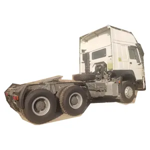 High roof Sinotruk tractor head 6*4 32 ton rated load tractor truck trailer head