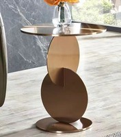 Petite table basse multifonctionnelle en acier inoxydable de luxe léger, style nordique moderne, design italien