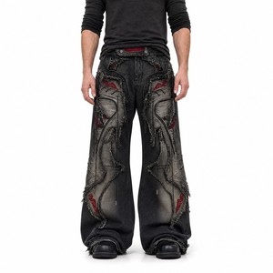 Jean large noir à appliques superposées, avec empiècements et fermetures éclair, broderie tribale rouge, style streetwear, vente en gros, personnalisable OEM ODM - Product Image 1
