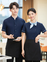 Nouvelle chemise de travail unisexe en polyester à boutons, manches courtes, pour l'été, idéale pour les serveurs, les salons de thé, les restaurants occidentaux et la restauration rapide.
