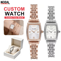 Montre de luxe personnalisée pour femme, quartz, or rose, lunette en cristal de diamant, bracelet en acier inoxydable, montre tonneau argentée pour femme
