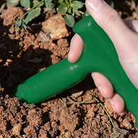 Perforateur de trou en plastique vert repiquage disséminateurs de graines plantation réglable utilisé dans les jardins domestiques