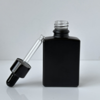 Grande quantité en stock, flacon d'huile essentielle en verre rectangulaire mat noir de 30 ml et 50 ml, flacons compte-gouttes de 1 oz