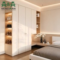 Système de dressing personnalisable pour toute la maison avec portes crème, coin de rangement en chêne, étagères ouvertes et boutons ronds