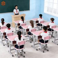 Ensemble bureau et chaise pour étudiants réglables en hauteur, design moderne, structure en acier ergonomique, mobilier scolaire avec rangement pour l'école primaire