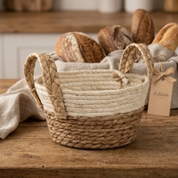 Panier de rangement en corde naturelle beige avec fond noir et poignées, panier tressé à la main, panier gigogne en jonc de mer pour pain et cadeaux
