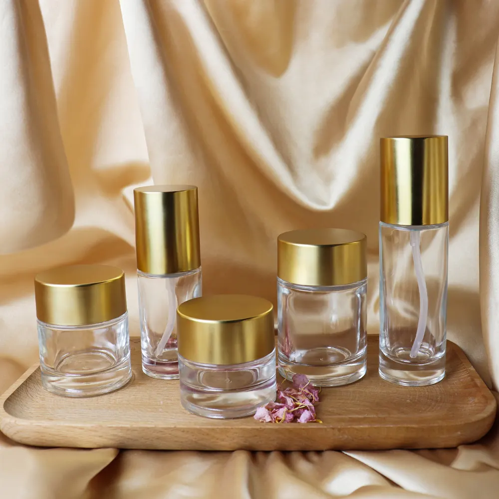 Luxus-Flaschen für Hautpflege mit dickem Boden 30 ml 50 ml 100 ml transparente Lotionsflasche Glas-Pumpflasche mit Goldenem Deckel