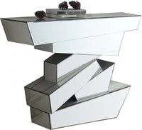 Table basse ronde en verre avec aspect diamant écrasé et base miroir
