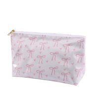 Sac de maquillage tendance en vinyle transparent avec nœud rose pour femme, sac de toilette de voyage, organiseur de cosmétiques en PVC