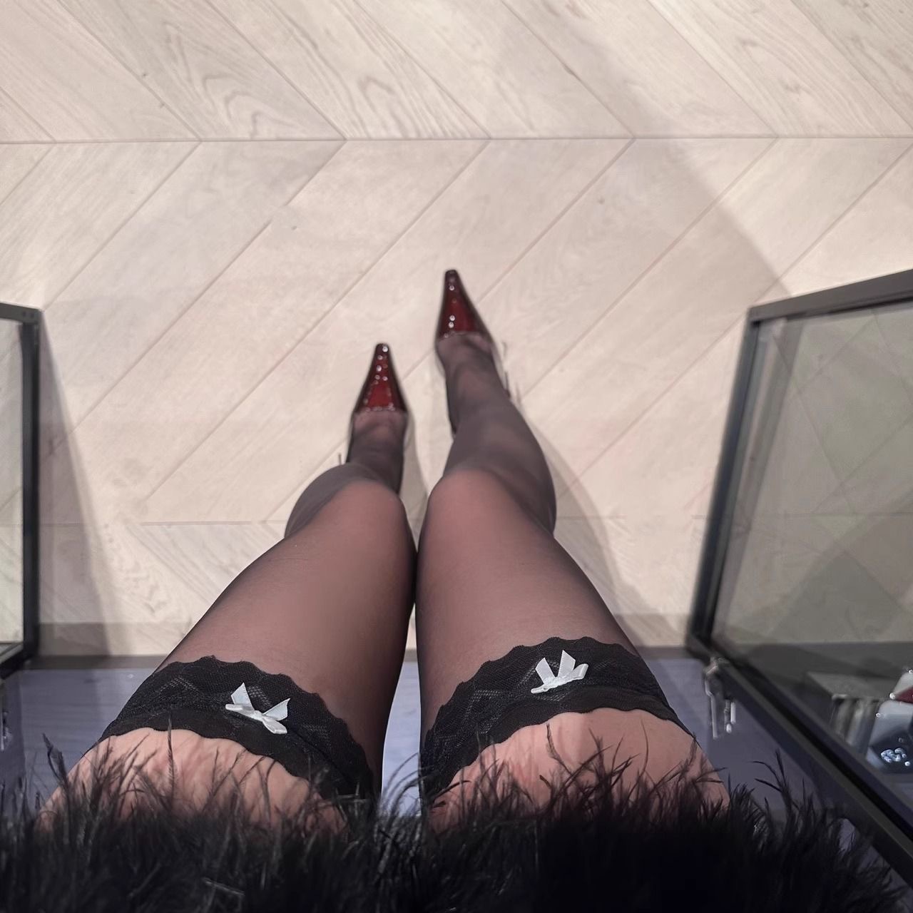 Black stockings, black lace, white butterfly